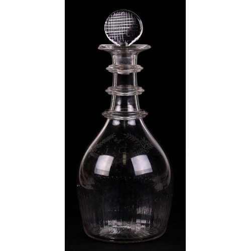 265 - An Irish Cork Waterloo Glass Co. decanter and stopper, circa 1800, of mallet form with three applied... 