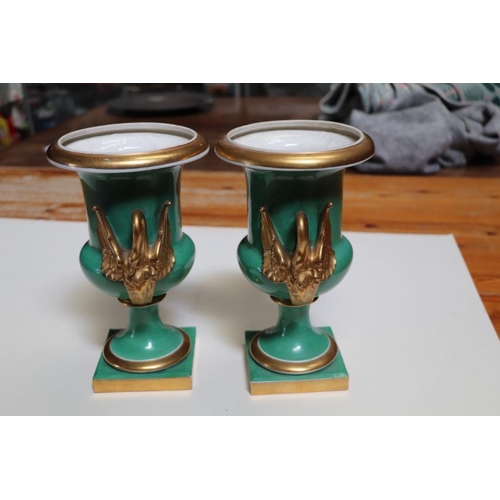 266 - A pair of 19th century continental vases with gilt swan form handles, 25cms high (2).Condition Repor... 