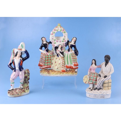 310 - A group of 19th century Staffordshire pottery figures to include Eva and Uncle Tom and a pocket watc... 