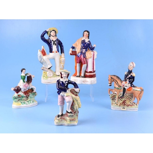 312 - A group of 19th century Staffordshire pottery figures, the largest 24cms high (8).