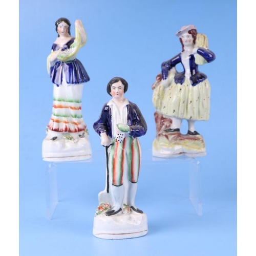 312 - A group of 19th century Staffordshire pottery figures, the largest 24cms high (8).