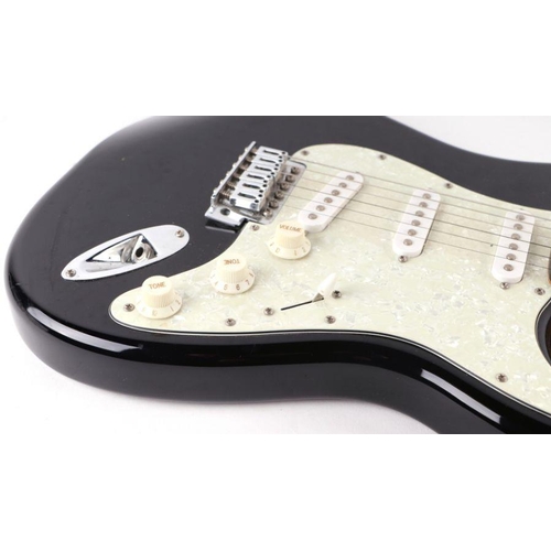 330 - A Squire Strat Fender electric guitar, 100cms long.