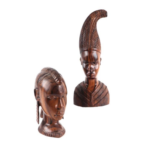 336 - A pair of African hardwood bust depicting a man and a woman. largest 32cm high