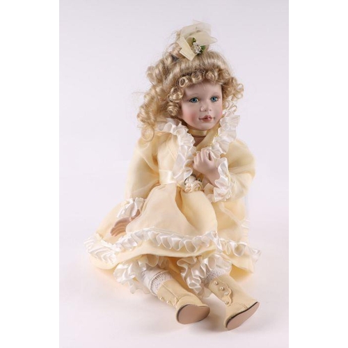 354 - A collection of modern bisque headed Victorian style dolls including examples by Ashton Drake Galler... 