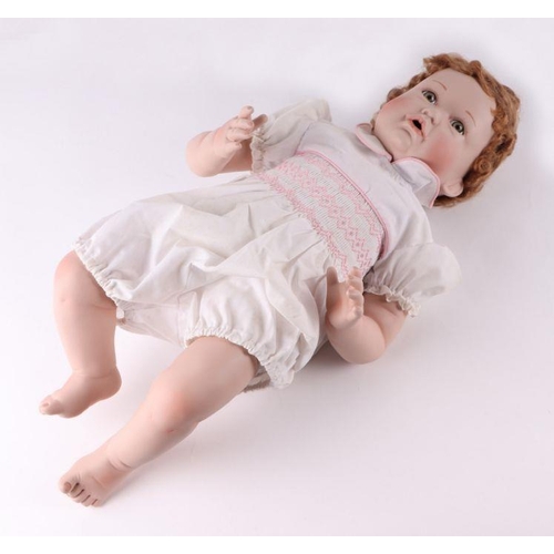 354 - A collection of modern bisque headed Victorian style dolls including examples by Ashton Drake Galler... 