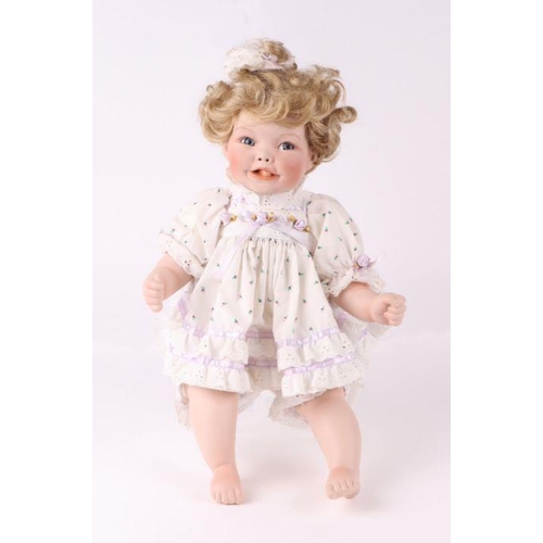 354 - A collection of modern bisque headed Victorian style dolls including examples by Ashton Drake Galler... 