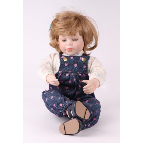 354 - A collection of modern bisque headed Victorian style dolls including examples by Ashton Drake Galler... 