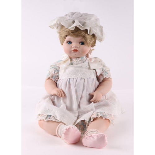 354 - A collection of modern bisque headed Victorian style dolls including examples by Ashton Drake Galler... 