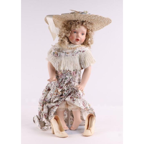 354 - A collection of modern bisque headed Victorian style dolls including examples by Ashton Drake Galler... 