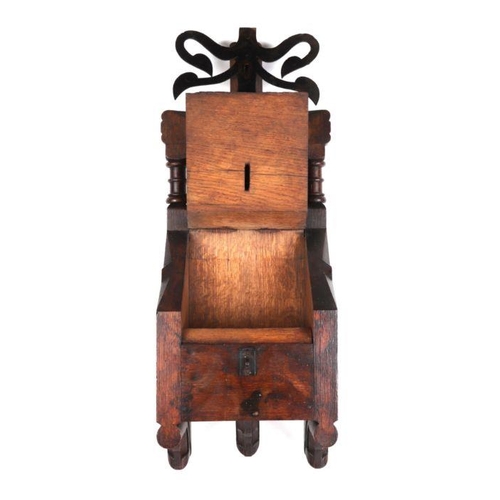 380 - A Gothic Revival oak and wrought iron church collection or money box, 64cms high.