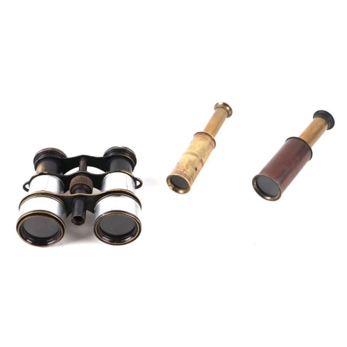 382 - Two brass telescopes or opera monoculars; together with a pair of opera binoculars (3).