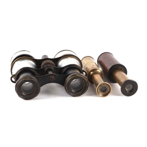 382 - Two brass telescopes or opera monoculars; together with a pair of opera binoculars (3).