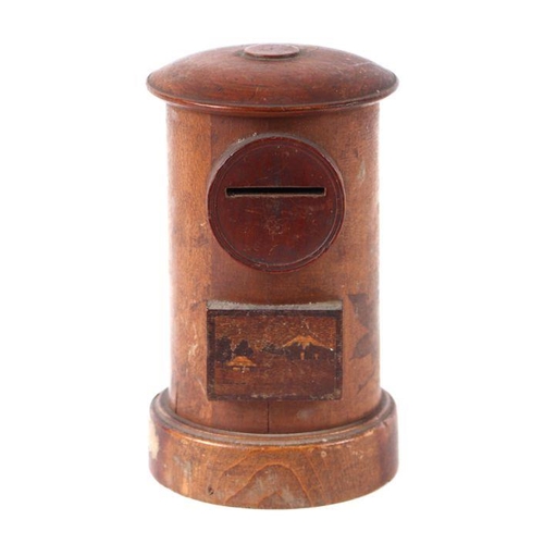 405 - A treen moneybox in the form of a postbox, 15cms high.