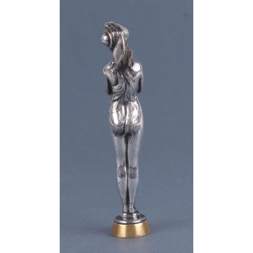 418 - An Art Nouveau silver plated figural desk seal in the form of a fairy with monogramed matrix, 13cm h... 