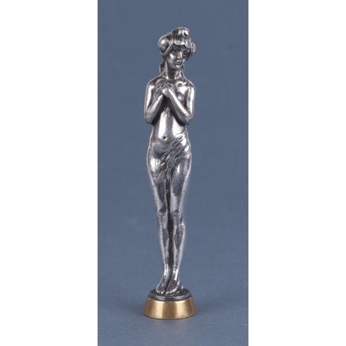 418 - An Art Nouveau silver plated figural desk seal in the form of a fairy with monogramed matrix, 13cm h... 