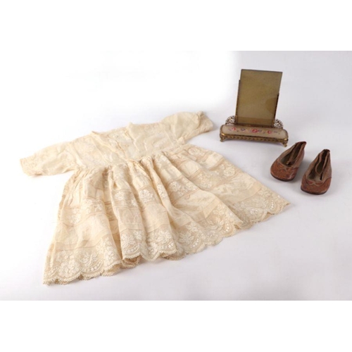 419 - A Victorian christening gown, a pair of child's leather shoes together with a gilt metal photo frame... 