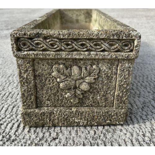 5 - A reconstituted stone rectangular planter, 61cms wide.