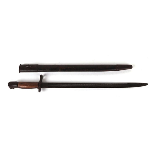 52 - A WWI bayonet in a leather scabbard, 58cms long.