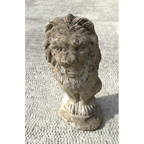 6 - A group of three well weathered stone figures of seated lions, each 44cms high (3).