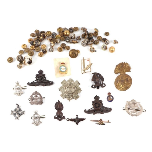 63 - Assorted militaria items to include an ARP tin, cap badges, buttons, flashes, a miniature group of f... 