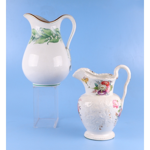 291 - A collection of large Victorian and later water jugs to include Losol Ware and Booths; together with... 