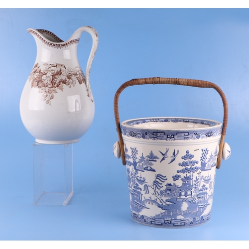 291 - A collection of large Victorian and later water jugs to include Losol Ware and Booths; together with... 