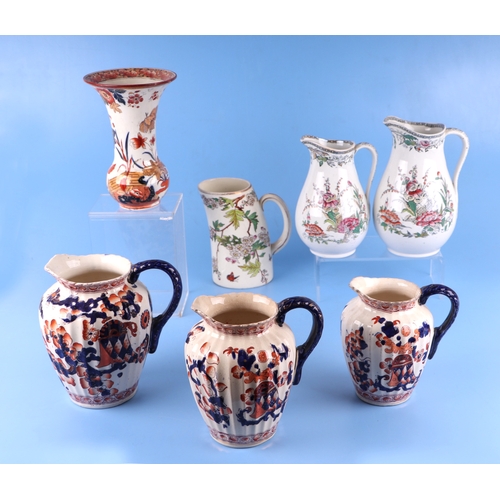 295 - A collection of Victorian and later jugs to include Ridgeway and Masons.