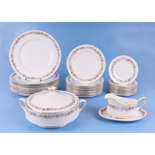 301 - A large quantity of Paragon Belinda pattern tea and dinner wares.