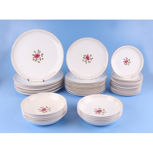 302 - A large quantity of Royal Doulton Sweetheart Rose pattern tea and dinner wares.