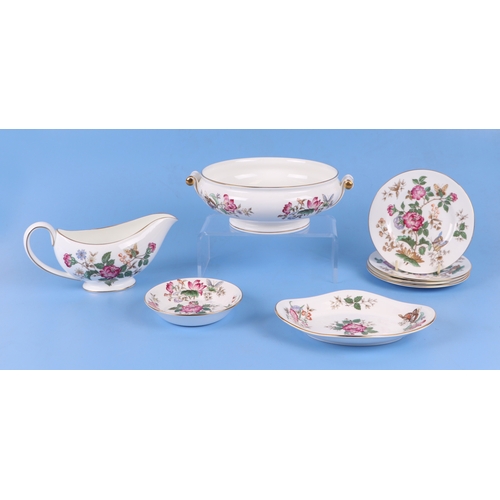 303 - A large quantity of Wedgwood Charnwood pattern tea and dinner wares.