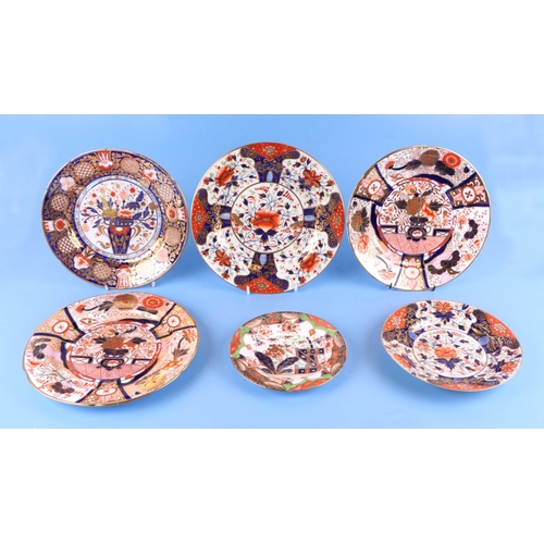 284 - A quantity of early 19th century Imari pattern ceramics to include plates and tea wares.