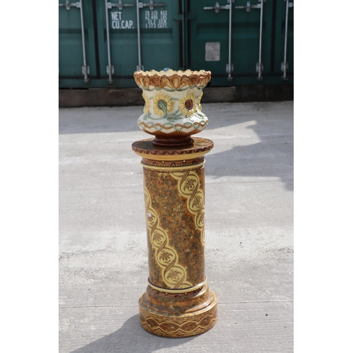 288 - A Victorian Burmantofts majolica planter, 26cms high, standing on an associated Minton column, 69cms... 