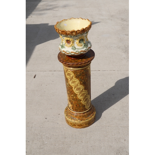 288 - A Victorian Burmantofts majolica planter, 26cms high, standing on an associated Minton column, 69cms... 