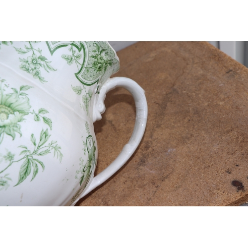 292 - A Victorian green & white footbath and water jug decorated with flowers, the footbath 47cms wide, th... 