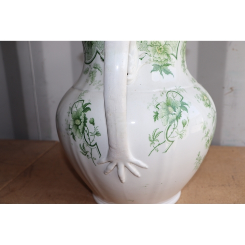 292 - A Victorian green & white footbath and water jug decorated with flowers, the footbath 47cms wide, th... 