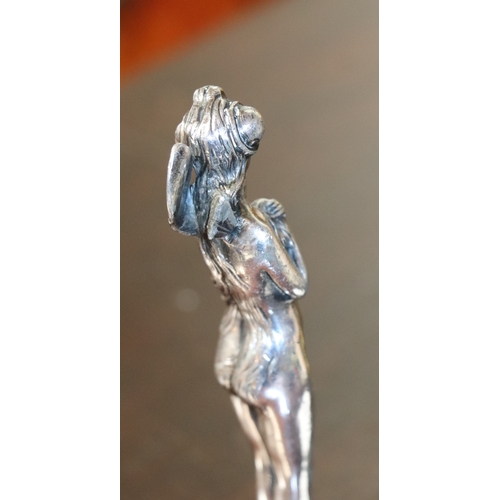 418 - An Art Nouveau silver plated figural desk seal in the form of a fairy with monogramed matrix, 13cm h... 