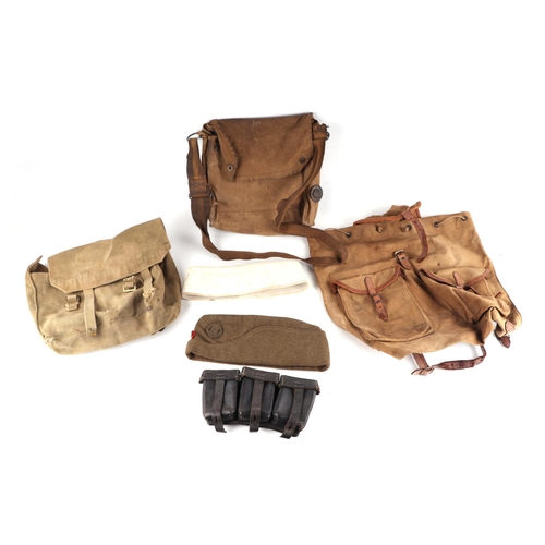 100 - A WWII German leather ammunition pouch and other British WWII pouches, haversacks and caps.