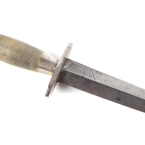 104 - A WWII Fairbairn Sykes fighting knife, the steel blade signed 'F&S Fighting Knife', the reverse sign... 