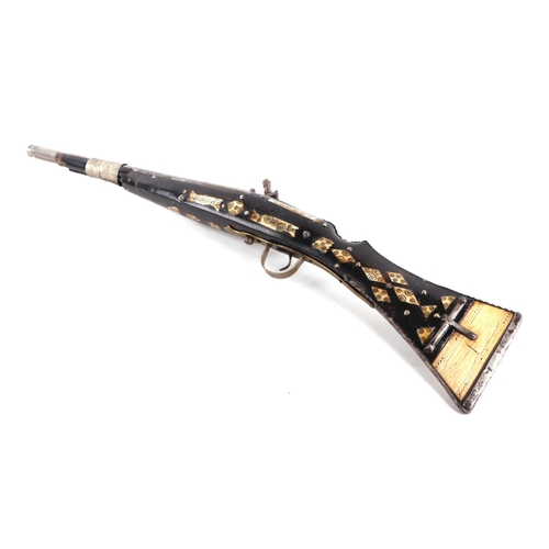 109 - An Afghan Miquelet musket with steel barrel, 73cms long.