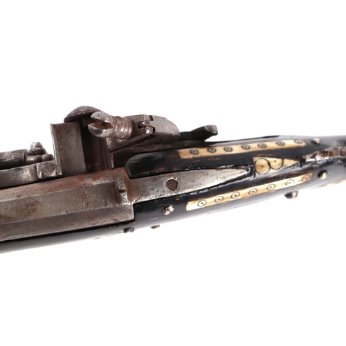109 - An Afghan Miquelet musket with steel barrel, 73cms long.