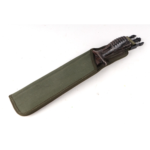 113 - British Army SA80 bayonet in scabbard. Blade length 17.5cms (6.875ins)