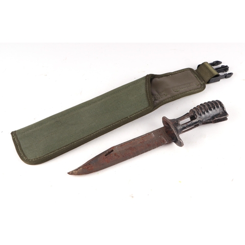 113 - British Army SA80 bayonet in scabbard. Blade length 17.5cms (6.875ins)