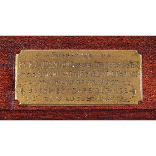 116 - A repainted Victorian Police truncheon 45cms (17.75ins) long on a wooden mount with brass plaque whi... 