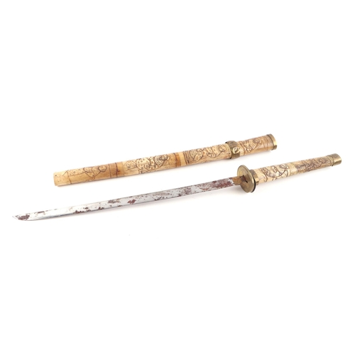 119 - A late 19th century Japanese carved bone short sword or Wakizashi, carved all over with figures. Bla... 