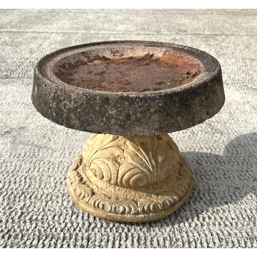 61 - A reconstituted stone bird bath, 38cms diameter.
