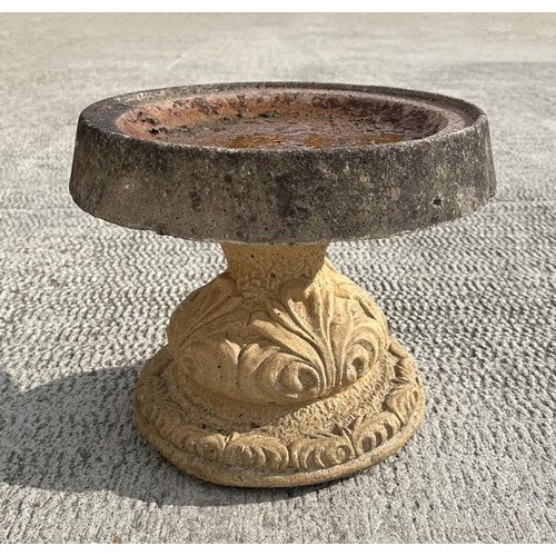 61 - A reconstituted stone bird bath, 38cms diameter.
