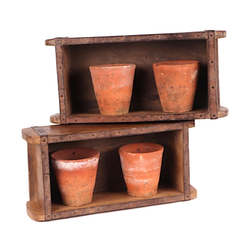 63 - A pair of metal bound wooden brick moulds / planters, each 32cms wide (2).