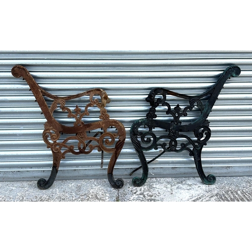 68 - A pair of Coalbrookdale style cast iron bench ends.