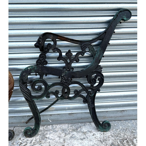 68 - A pair of Coalbrookdale style cast iron bench ends.