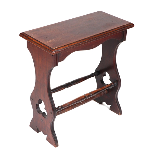 795 - An oak Arts & Crafts style stool with shaped and pierced end supports joined by pole stretchers, 53c... 